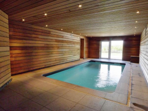 Comfortable chalet with indoor pool hammam and sauna near Stoumont Stoumont